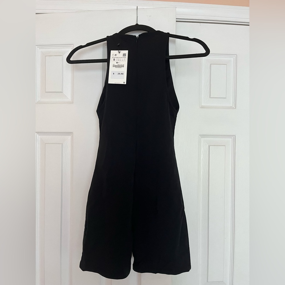 Never been worn black onesie